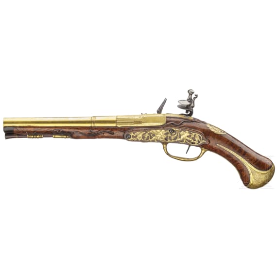 A splendid fire-gilt flintlock pistol by Jean Brion &agrave; Paris, circa 1710