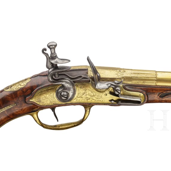 A splendid fire-gilt flintlock pistol by Jean Brion &agrave; Paris, circa 1710