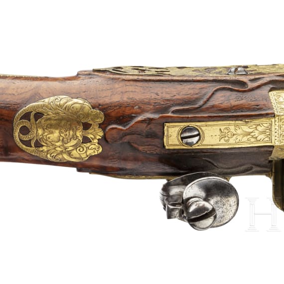 A splendid fire-gilt flintlock pistol by Jean Brion &agrave; Paris, circa 1710