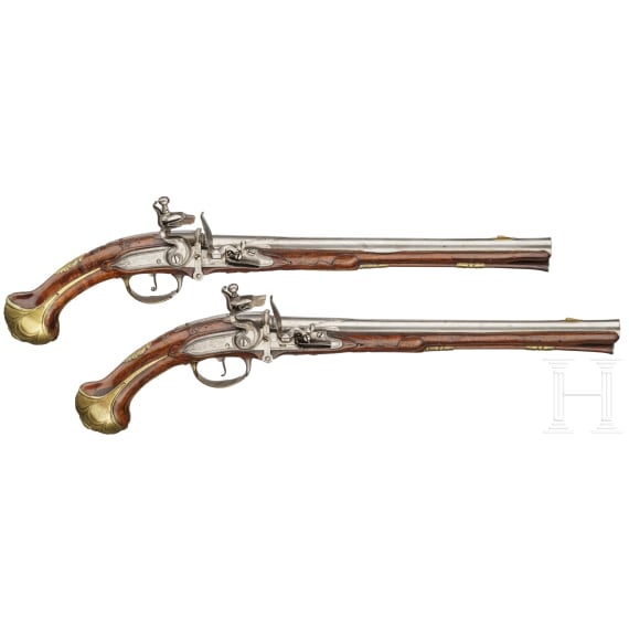 A pair of long Flemish breechloading flintlock pistols, circa 1720/30