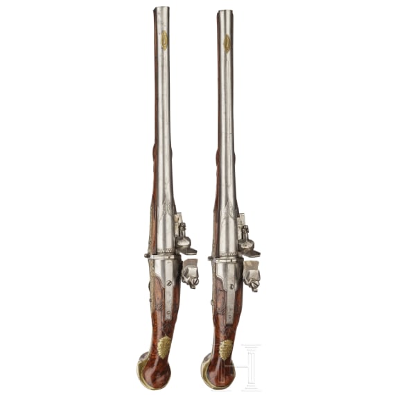 A pair of long Flemish breechloading flintlock pistols, circa 1720/30