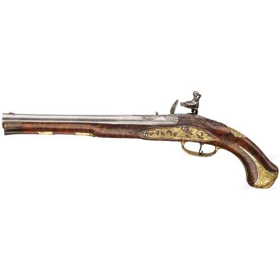 A deluxe German flintlock pistol with fine chiselling, circa 1730