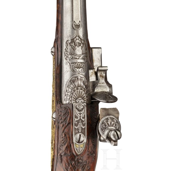 A deluxe German flintlock pistol with fine chiselling, circa 1730