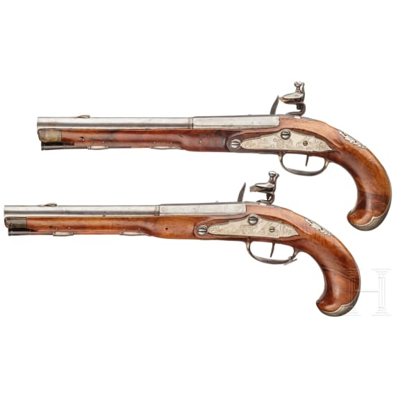 A pair of silver-mounted flintlock pistols, Wittemann in Gie&szlig;en, circa 1750