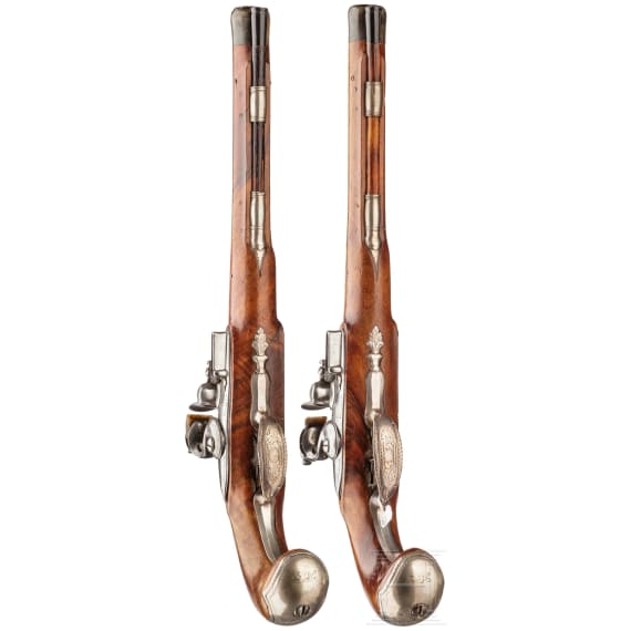 A pair of silver-mounted flintlock pistols, Wittemann in Gie&szlig;en, circa 1750