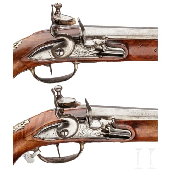 A pair of silver-mounted flintlock pistols, Wittemann in Gie&szlig;en, circa 1750