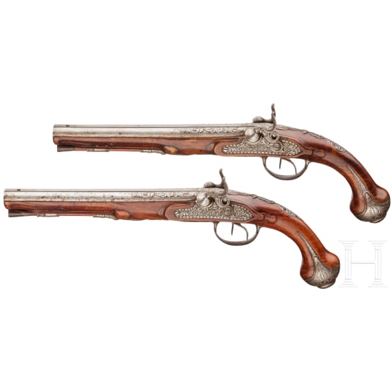 A pair of double-barreled percussion pistols with profuse chiselling, G. A. Moritz in Zella St. Blasii, circa 1820/30