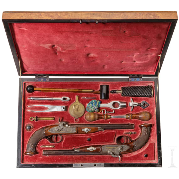A cased pair of percussion pistols, Johann Adam Kuchenreuter in Regensburg, circa 1840