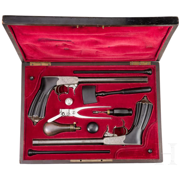 A cased pair of underhammer target pistols, Cusson et Rossignol of Clermont-Ferrand, circa 1855