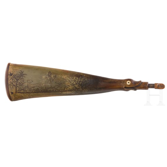 An engraved German powder flask, 18th century