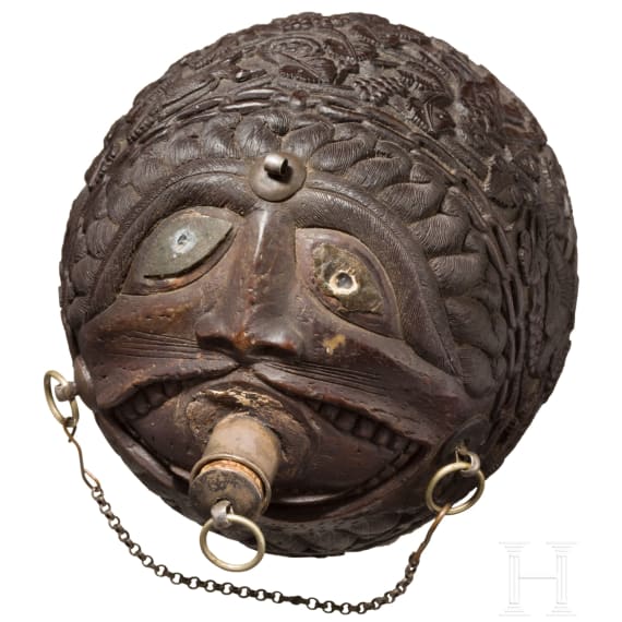 A Dutch-Colonial, probably Indonesian coconut powder horn, 19th century