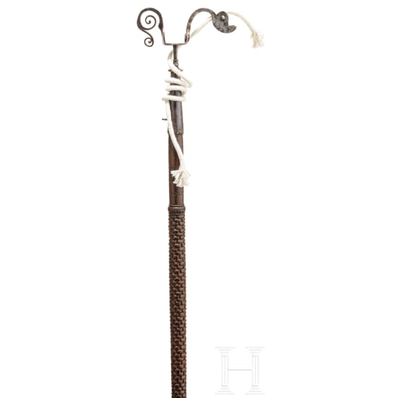 A rare match holder with combined musket rest, German, ca. 1600