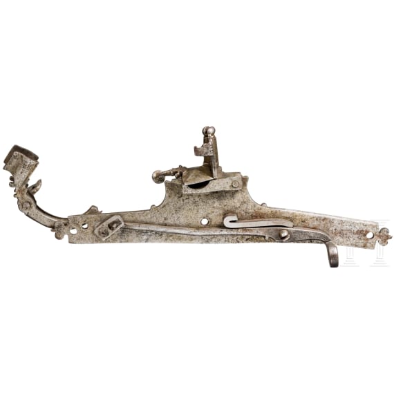 An Italian chiselled matchlock mechanism, 16th century