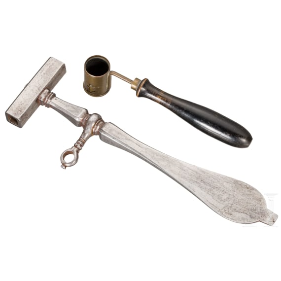 A German wheel-lock spanner and a powder measure, 16th/17th century