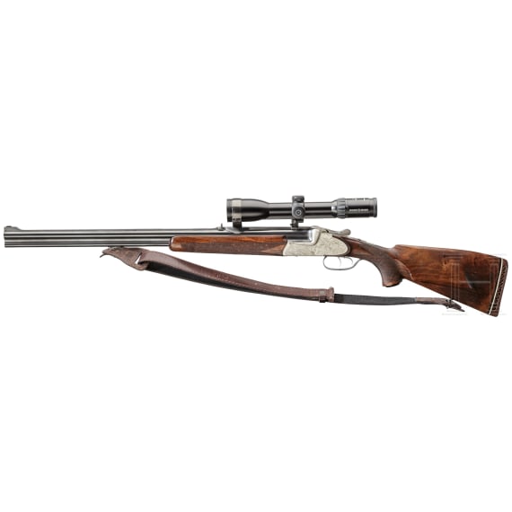 An over-and-under Scheiring-D&uuml;sel combination rifle with insert barrel and Schmidt & Bender scope