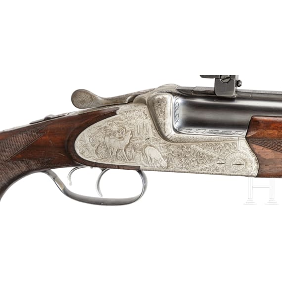 An over-and-under Scheiring-D&uuml;sel combination rifle with insert barrel and Schmidt & Bender scope