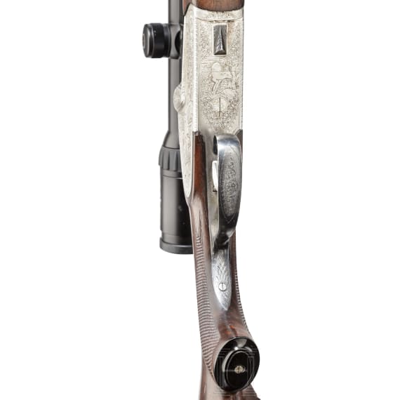 An over-and-under Scheiring-D&uuml;sel combination rifle with insert barrel and Schmidt & Bender scope