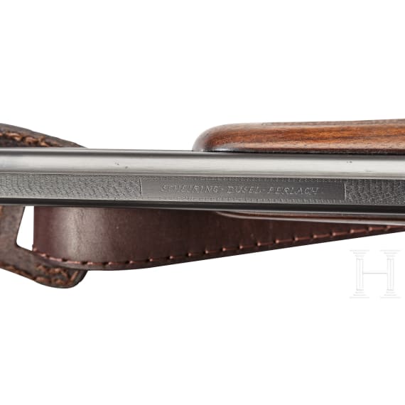 An over-and-under Scheiring-D&uuml;sel combination rifle with insert barrel and Schmidt & Bender scope