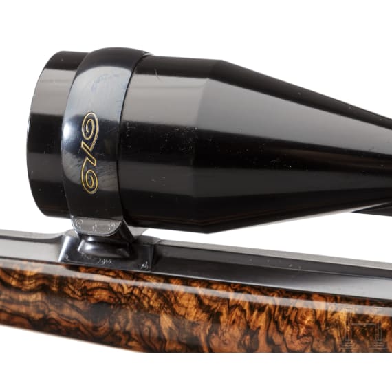 A cased deluxe break-action rifle by Karl Hauptmann, Ferlach, with Zeiss scope