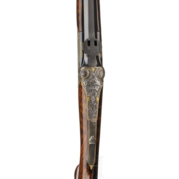 A cased deluxe break-action rifle by Karl Hauptmann, Ferlach, with Zeiss scope