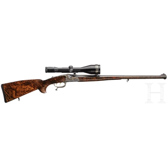A cased deluxe break-action rifle by Karl Hauptmann, Ferlach, with Zeiss scope