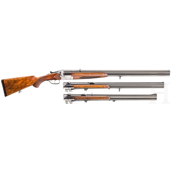 A Merkel over-and-under rifle with Zeiss scope, interchangeable O/U combination barrel with Zeiss scope, interchangeable O/U shotgun barrel