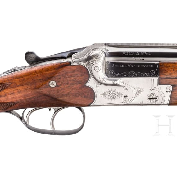 A Merkel over-and-under rifle with Zeiss scope, interchangeable O/U combination barrel with Zeiss scope, interchangeable O/U shotgun barrel