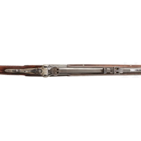 A Ferlach over-and-under rifle with Zeiss scope
