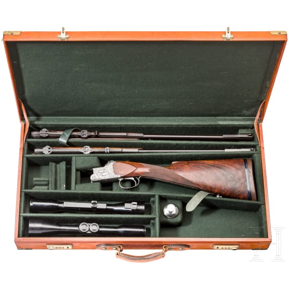 A cased O/U rifle FN Mod. Express with Hertel & Reuss scope and interchangeable O/U rifle barrel with Hertel & Reuss scope