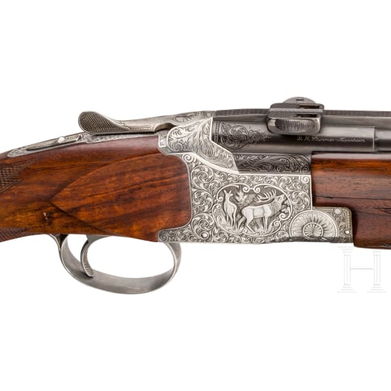 A cased O/U rifle FN Mod. Express with Hertel & Reuss scope and interchangeable O/U rifle barrel with Hertel & Reuss scope