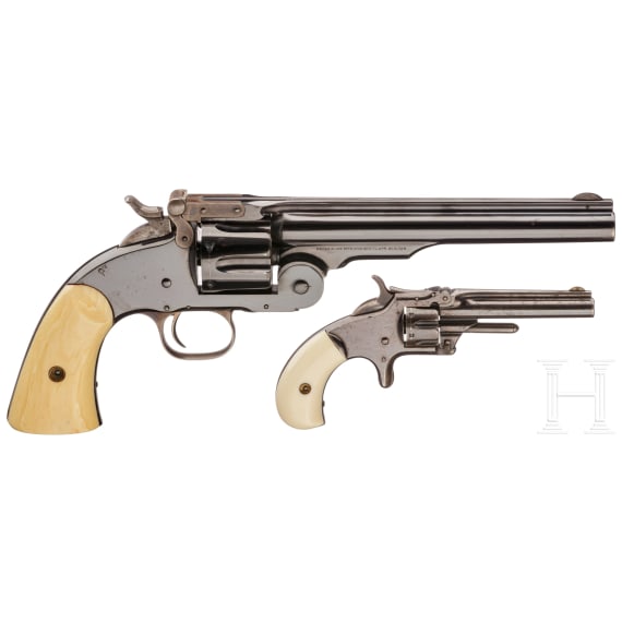 A cased Smith & Wesson 2nd Model Schofield Single Action Revolver and a No. 1 3rd issue revolver