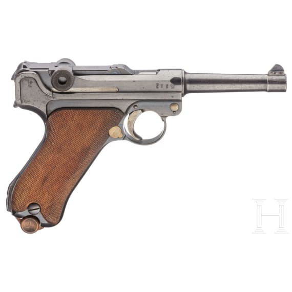 A DWM 1917 marked Luger 08 pistol with 2 magazines with matching numbers