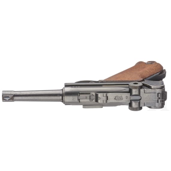 A DWM 1917 marked Luger 08 pistol with 2 magazines with matching numbers