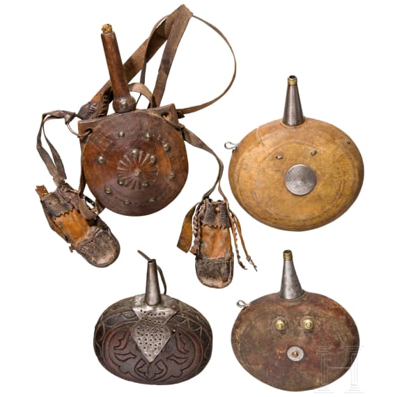 Four Afghan powder flasks, 19th century