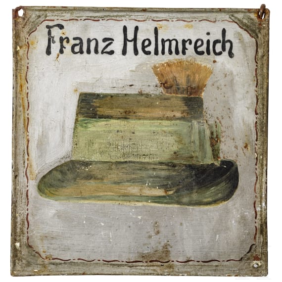 A German hatter's shop sign, dated 1877