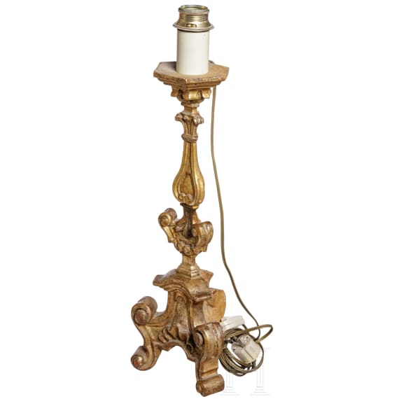 A fine German carved and original Louis XVI mirror with Baroque altar candle stick, 18th century