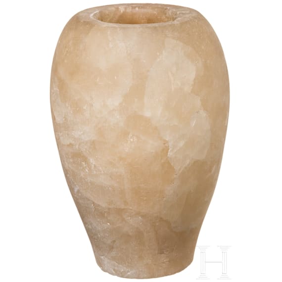 An Egyptian alabaster canopic jar, 2nd - 1st millenium B.C.