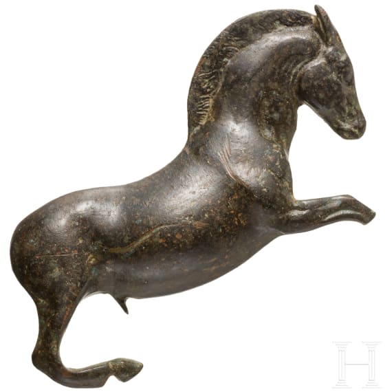 A large Greek bronze appliqué of a horse, circa 4th - 3rd century B.C.