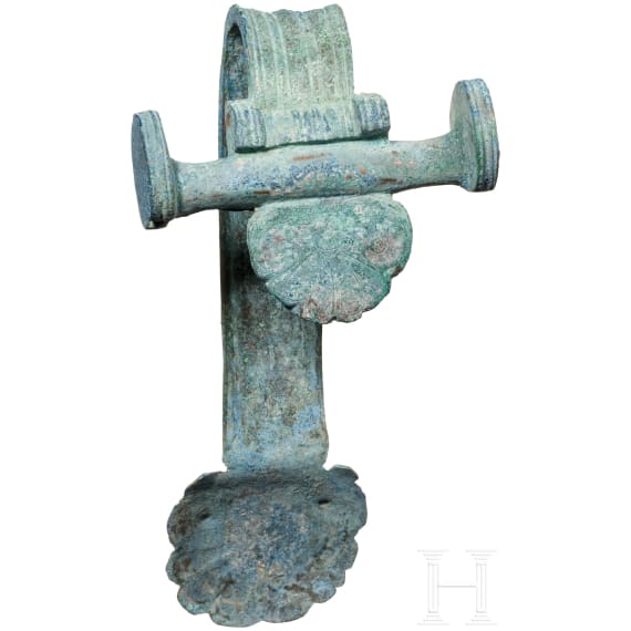 A Greek bronze vessel handle, 5th century B.C.