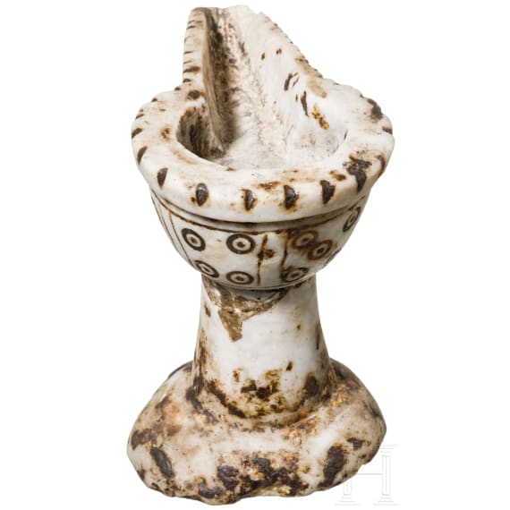A rare Early Byzantine marble oil lamp, 6th - 7th century