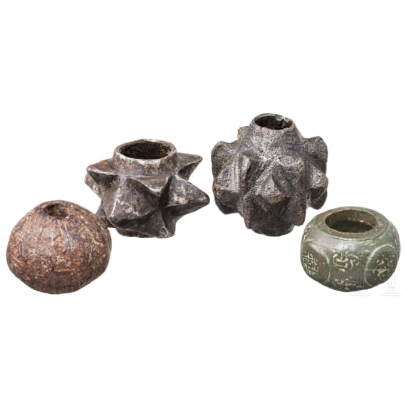 Four Near East and South East European mace heads, bronze and iron, 12th - 15th century