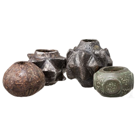 Four Near East and South East European mace heads, bronze and iron, 12th - 15th century