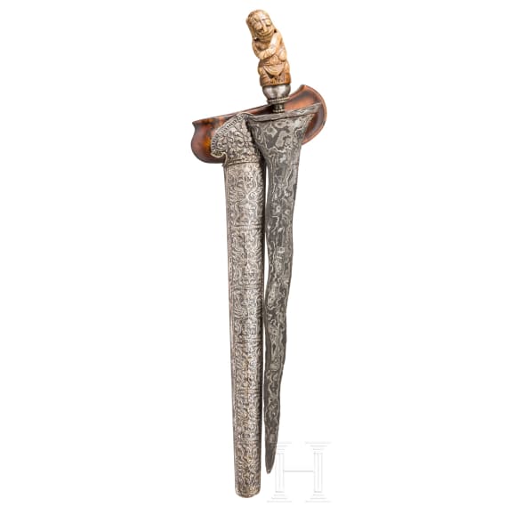 An early silver mounted Javanese Kris, the hilt 15th/16th century