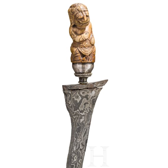 An early silver mounted Javanese Kris, the hilt 15th/16th century