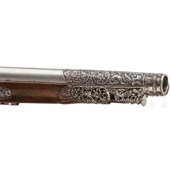 A luxury Italian miquelet rifle with chiselled decoration, Brescia, circa 1680