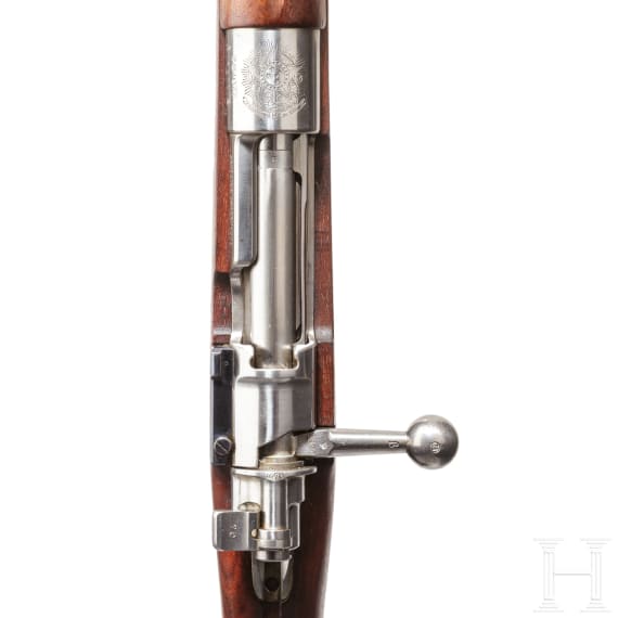 A Mauser rifle Mod. 1908, by DWM, with matching bayonet