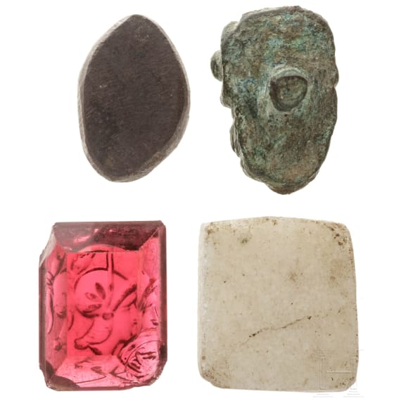 Ein Miniatur-Satyrkopf aus Bronze, eine Gemme mit Minervakopf und zwei geschnittene Steine, r&ouml;misch, 1. - 3. Jhdt.
