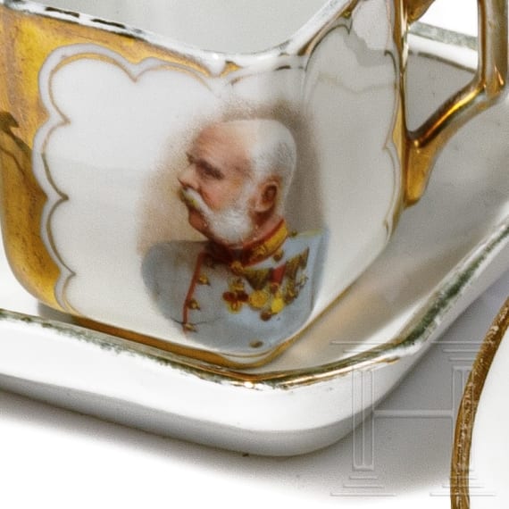 A Russian plate and two cups, circa 1900