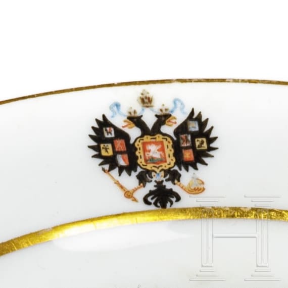 A Russian plate and two cups, circa 1900