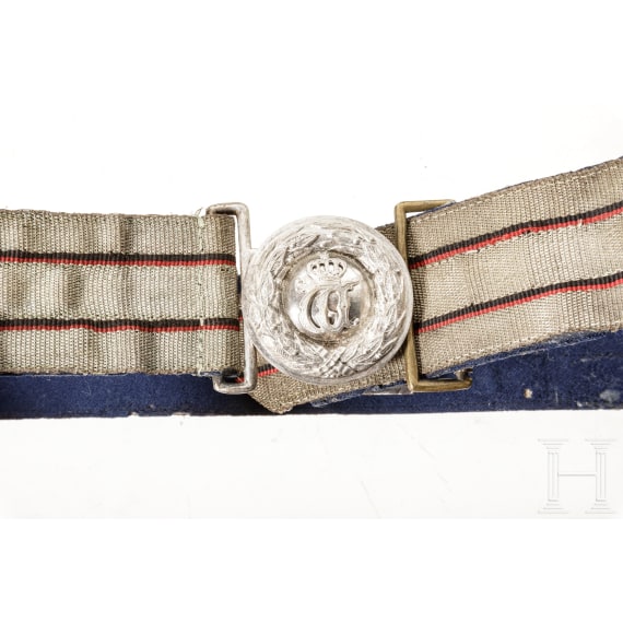A cartouche box, a belt and a shoulder board for officers, circa 1900